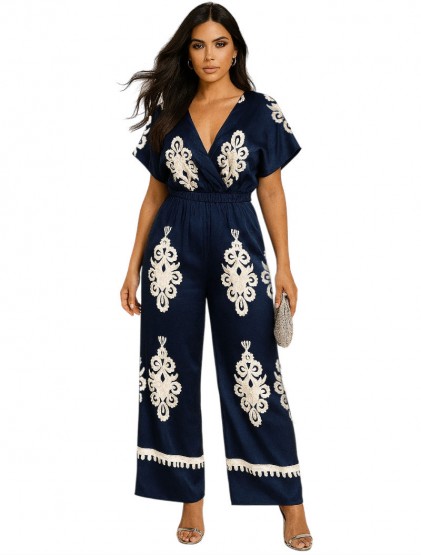 Satine jumpsuit with  flourish emblem prints