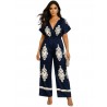 Satine jumpsuit with  flourish emblem prints