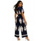 Satine jumpsuit with  flourish emblem prints